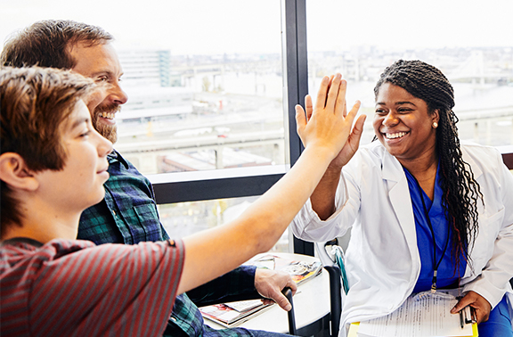 Doctor patient high five