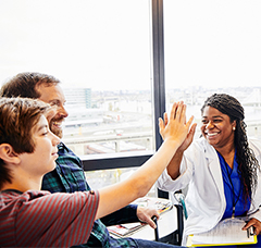 Doctor patient high five